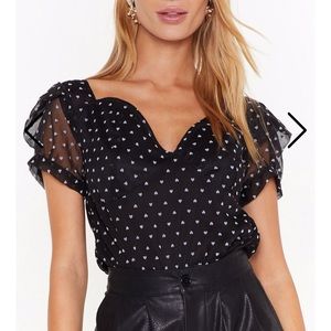 Sheer bodysuit with heart print